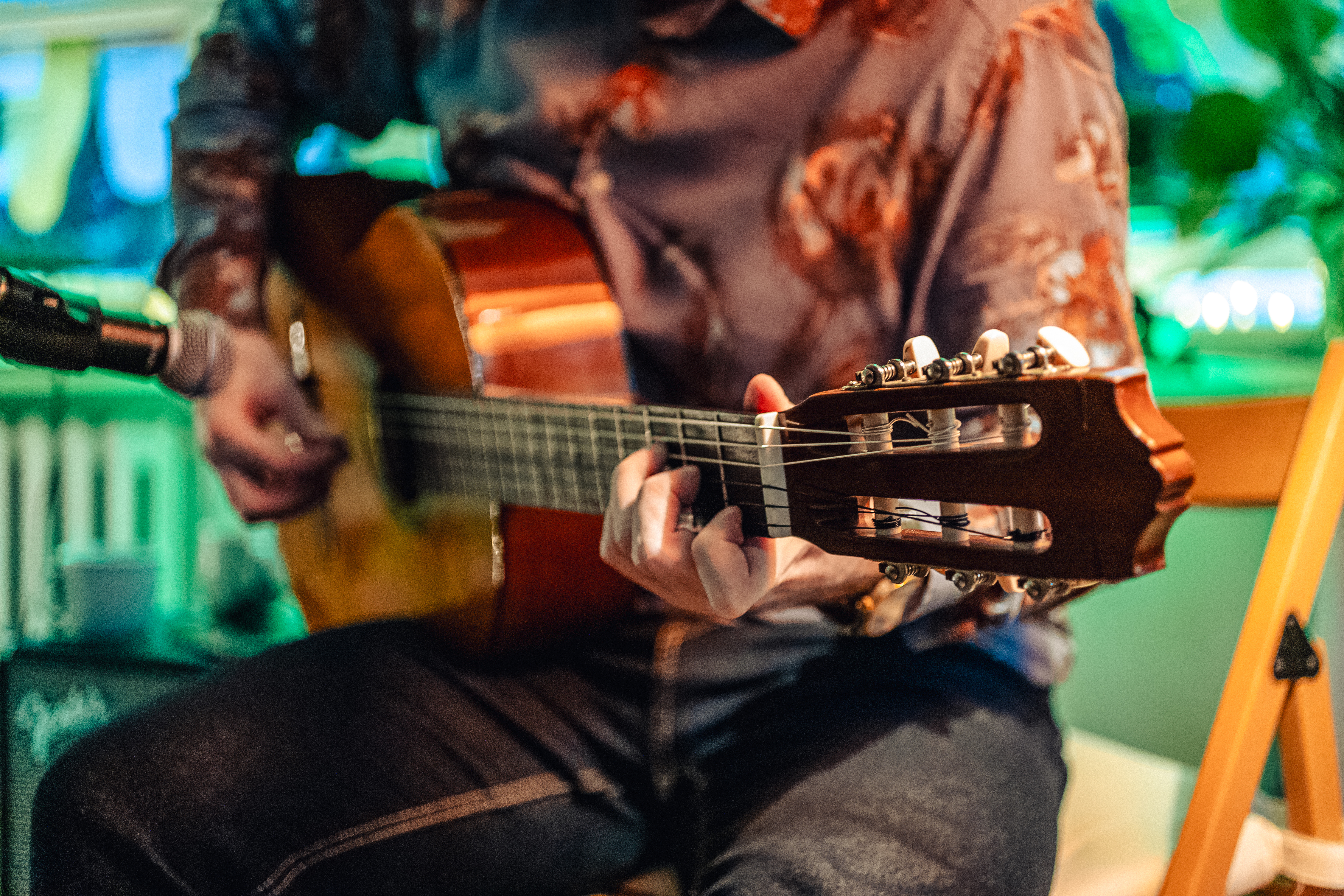 Musician playing an acoustic guitar